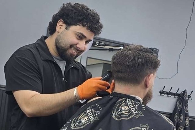 Ado, barber at Torres Chop Shop in Muscatine