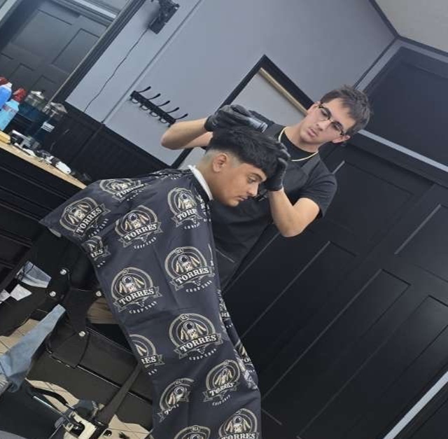 Mathew, barber at Torres Chop Shop in Muscatine